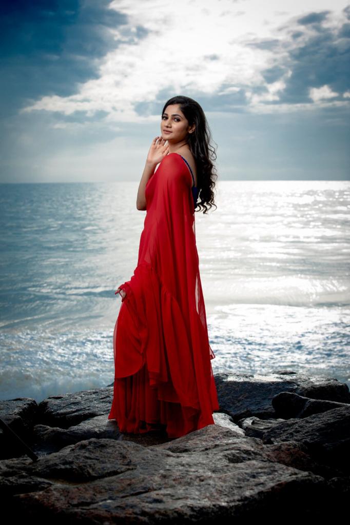 Losliya Red Saree New photos Losliya Red Saree New photos