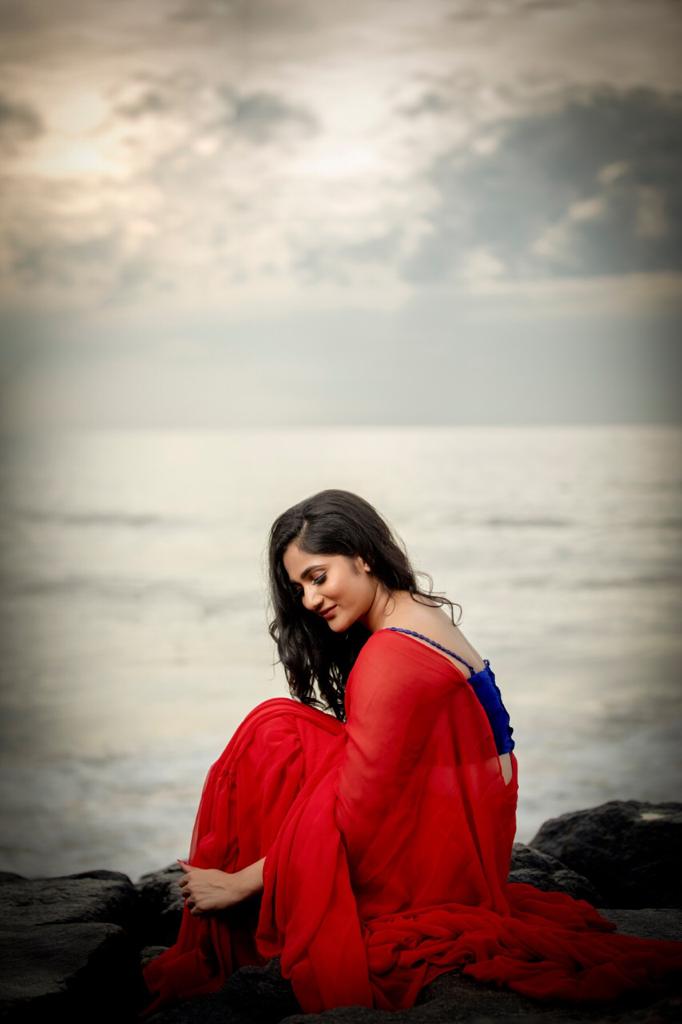 Losliya Red Saree New photos Losliya Red Saree New photos