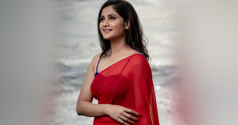 Losliya Red Saree  New photos