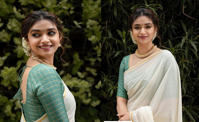 Actress Keerthy Suresh Mesmerising Looks In White Saree