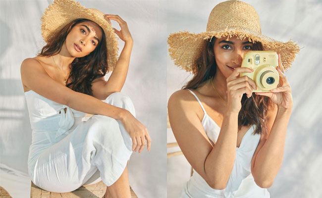 Actress Pooja Hegde Memerises Looks In white drees