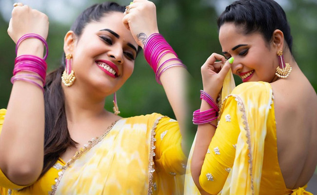 Anasuya Bharadwaj Latest Photoshoot in a Yellow Saree