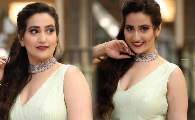 Manjusha is Awesome Looks in a White Dress