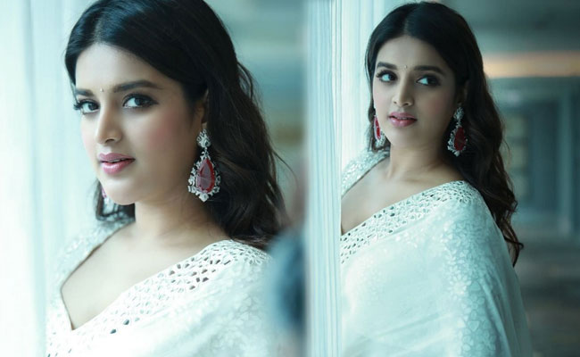 Nidhhi Agerwal Pretty Looks in White Saree